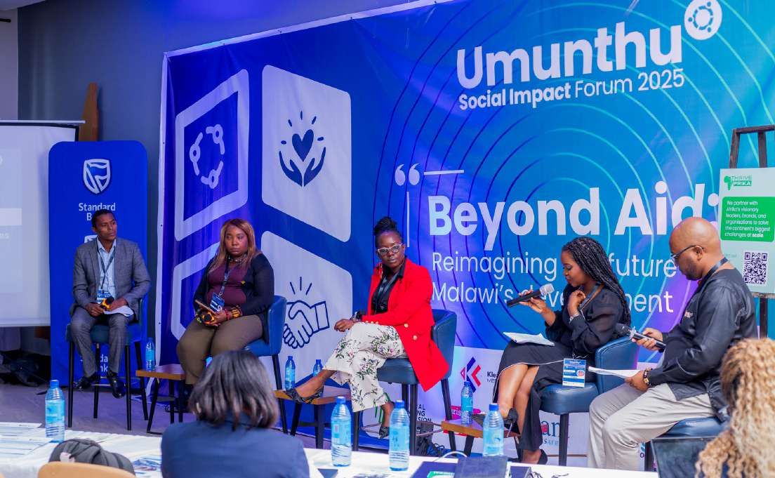 Umunthu Social Impact Forum — Beyond Aid panel on stage